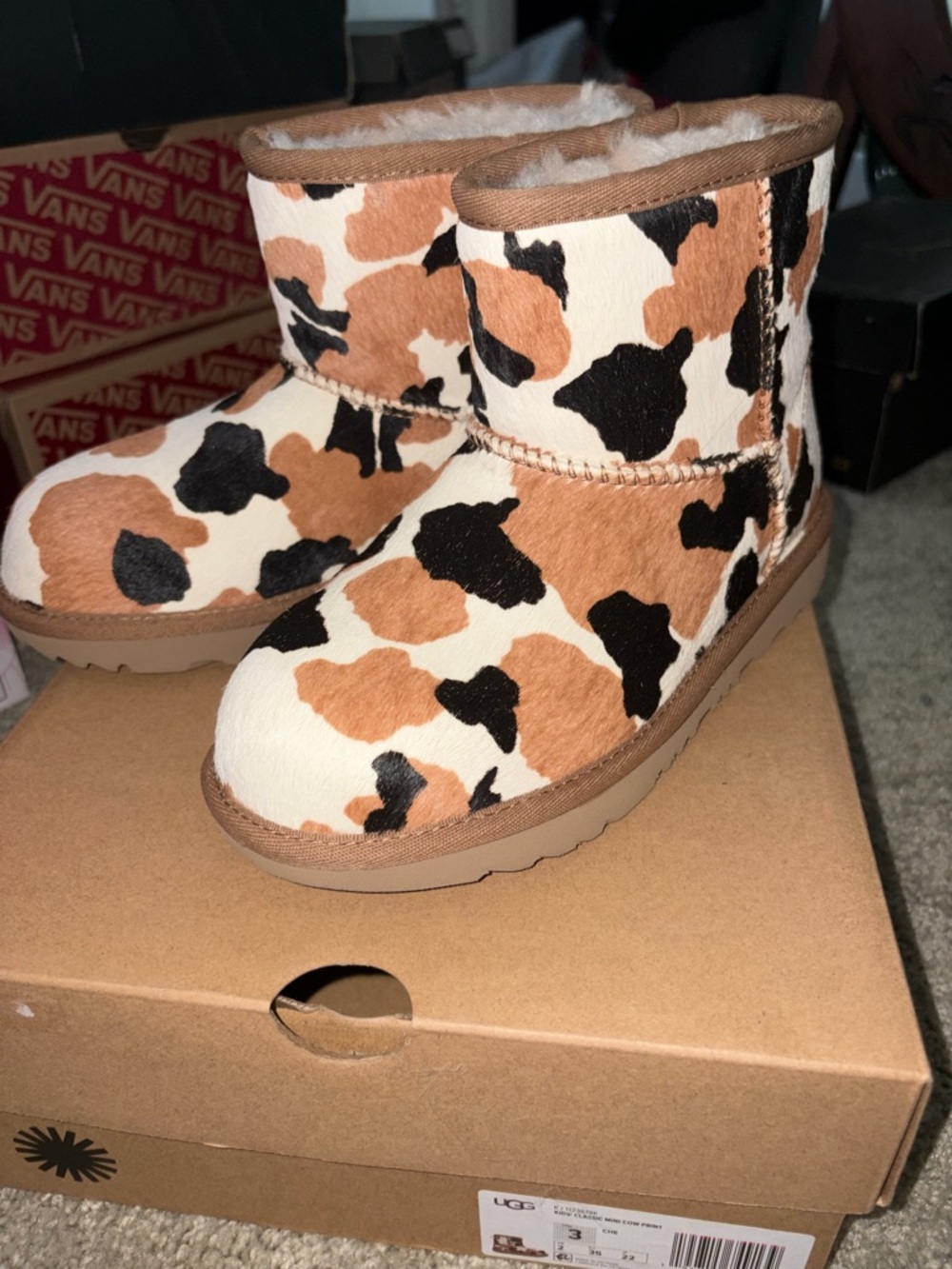 UGG Cow Print Mini Boots